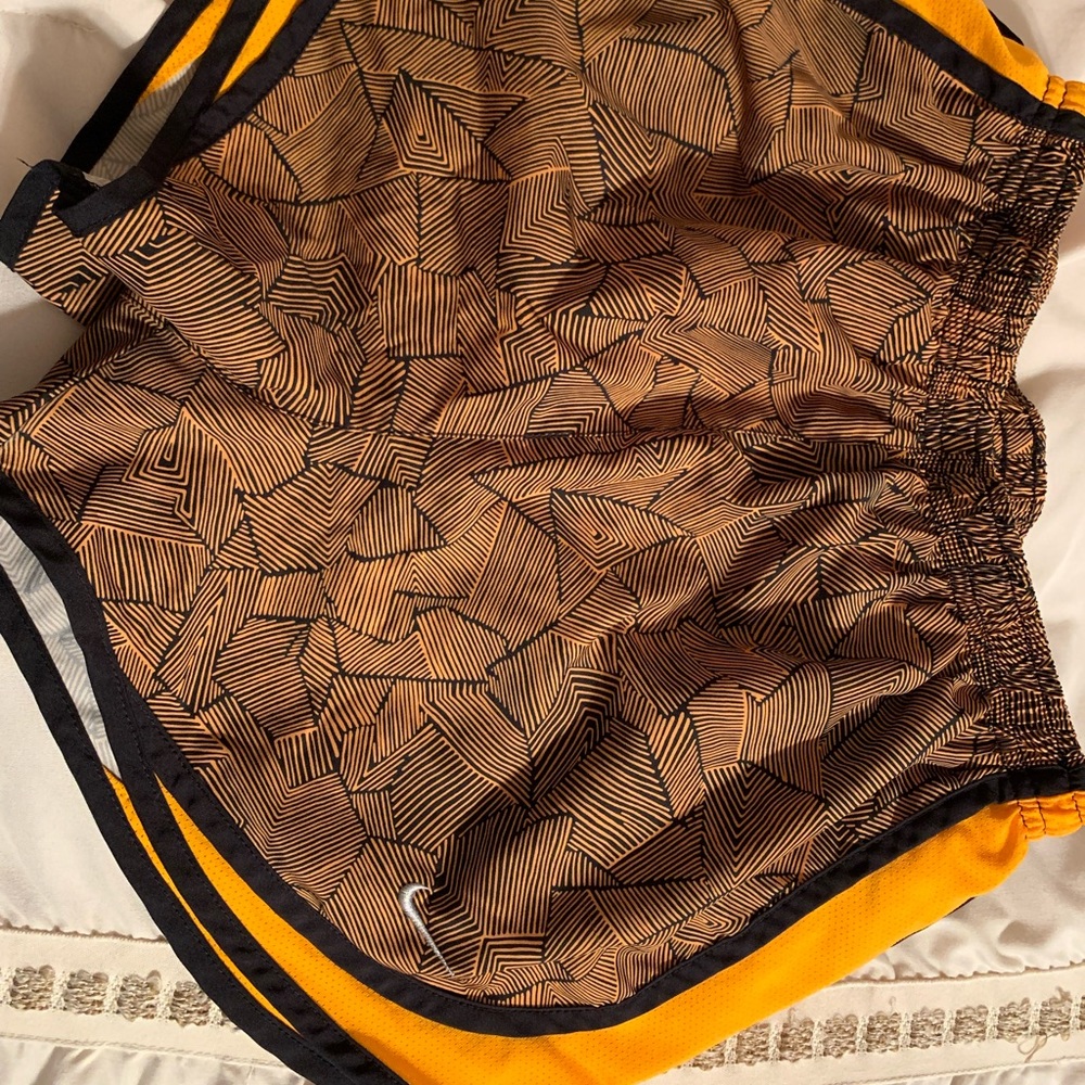 Nike shorts. Orange. Size Small.